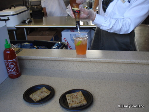 The Plum Wine pour and some rice pancakes in the China booth