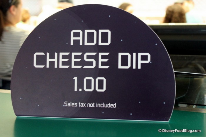 "Add Cheese Dip" Sign at Cosmic Ray's