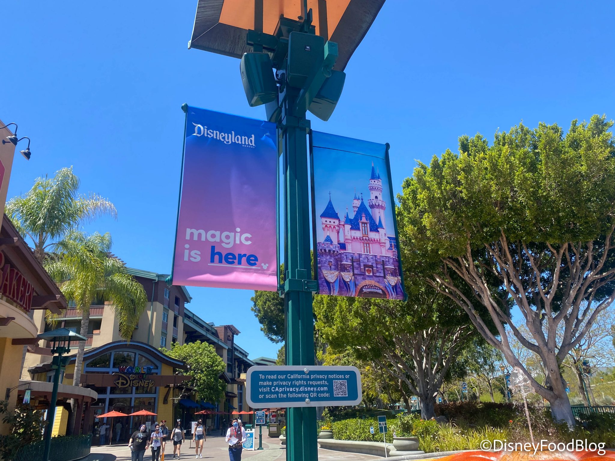 2021 DL DTD Disneyland Resort Downtown Disney Disneyland Reopening Banners Magic Is Here Sign 2048x1536 