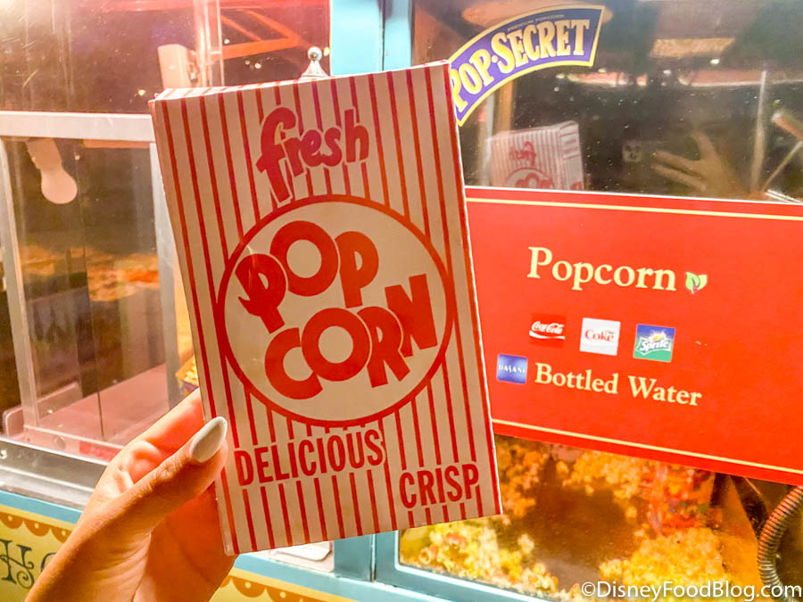 https://www.disneyfoodblog.com/wp-content/uploads/2021/08/2021-wdw-magic-kingdom-boo-bash-after-hours-opening-night-halloween-popcorn-cart-free-snacks-2.jpg