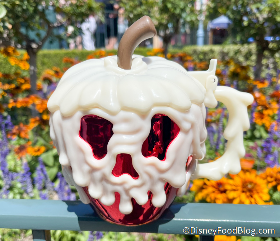 https://www.disneyfoodblog.com/wp-content/uploads/2021/09/2021-dlr-disneyland-red-rose-taverne-poison-apple-premium-mug-1.jpg