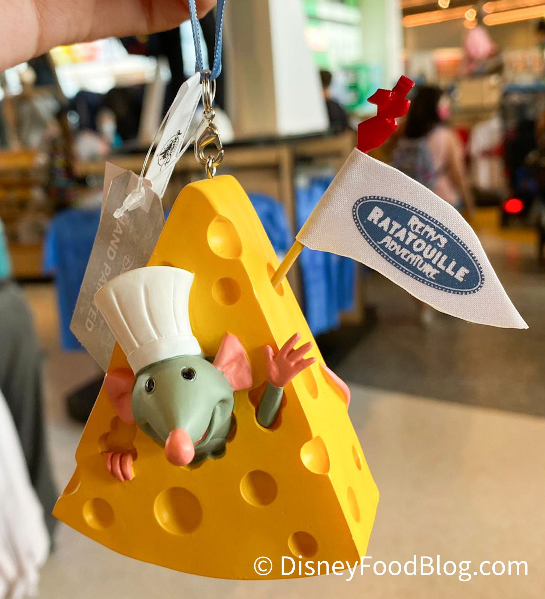 https://www.disneyfoodblog.com/wp-content/uploads/2021/10/2021-WDW-EPCOT-Creations-Shop-Remys-Ratatouille-Adventure-Merchandise-Ornament.jpg