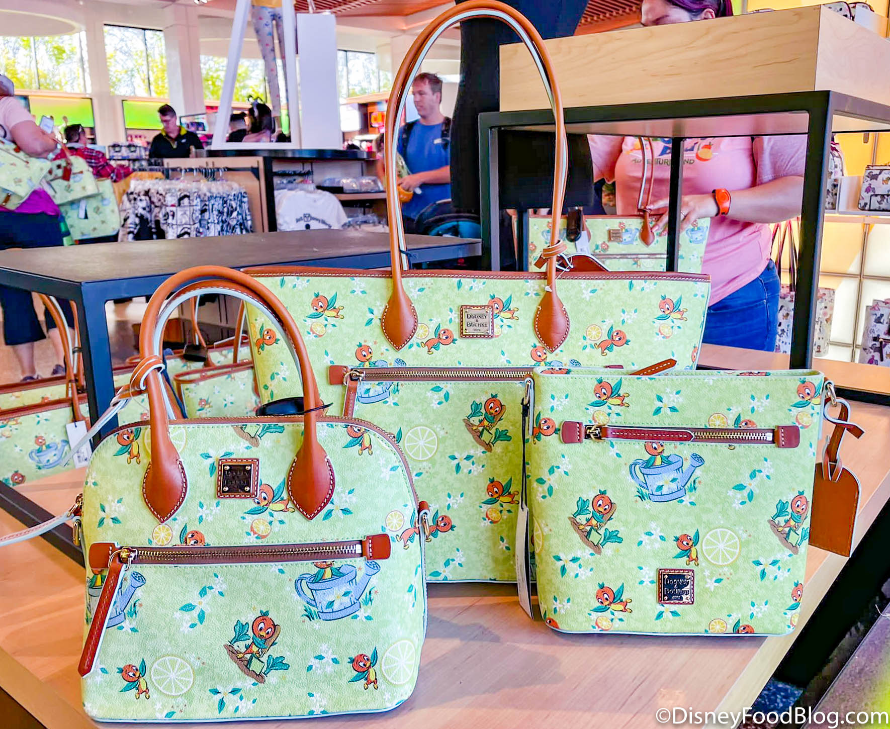 PHOTOS: NEW Dooney & Bourke it's a small world Collection Sailing Into  Walt Disney World on June 14th - WDW News Today