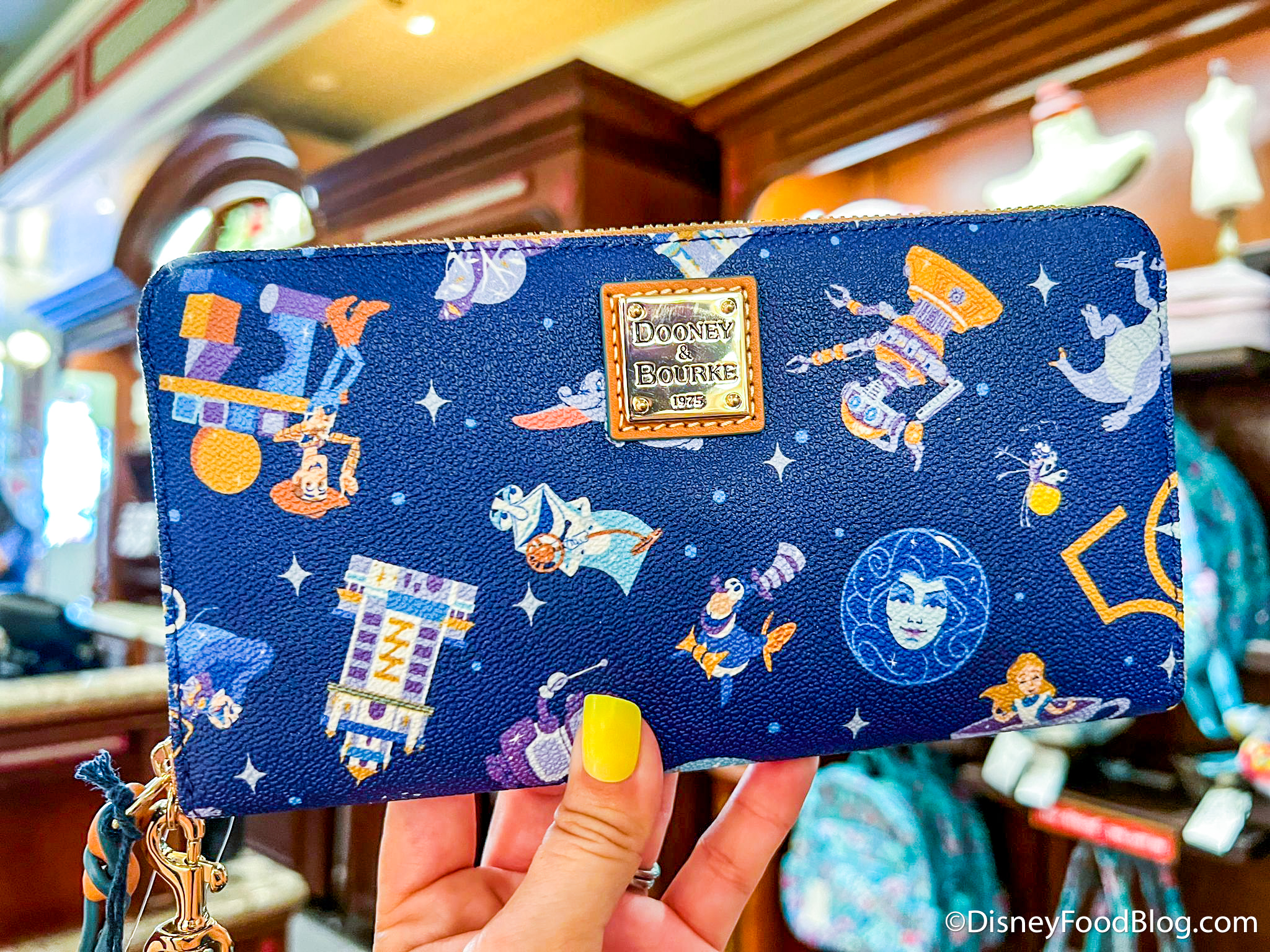 PHOTOS: Disney World Just Dropped A New 50th Anniversary Dooney & Bourke Bag  — And it's EPIC
