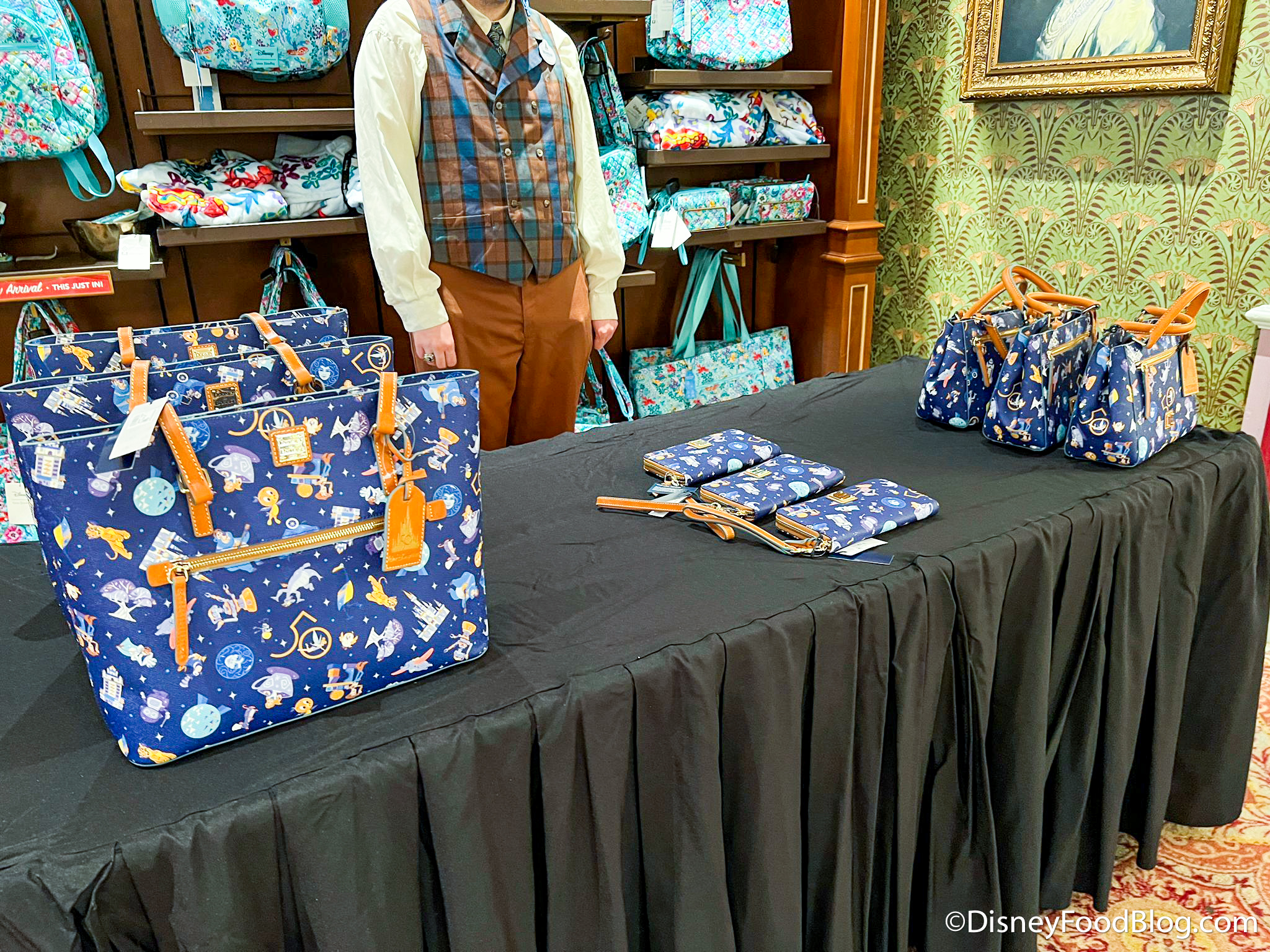 PHOTOS: New 50th Anniversary Holographic Dooney & Bourke Bags Debut at Walt  Disney World - WDW News Today