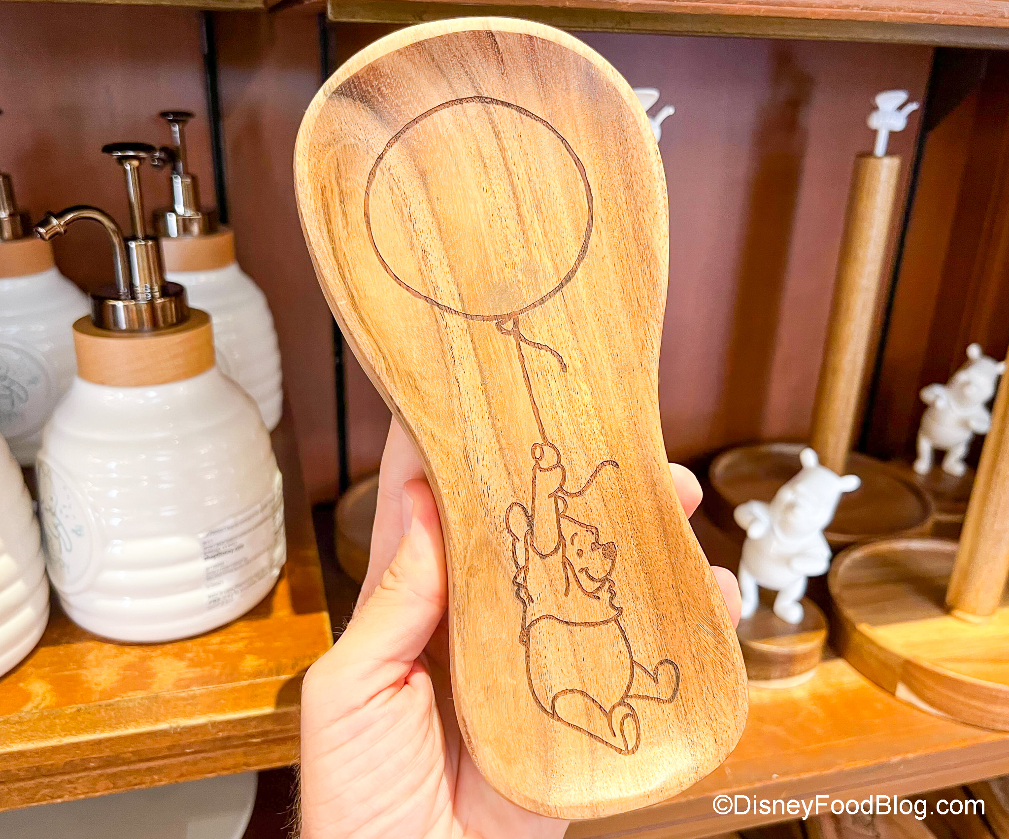 https://www.disneyfoodblog.com/wp-content/uploads/2022/07/2022-wdw-mk-emporim-pooh-spoon-rest.jpg