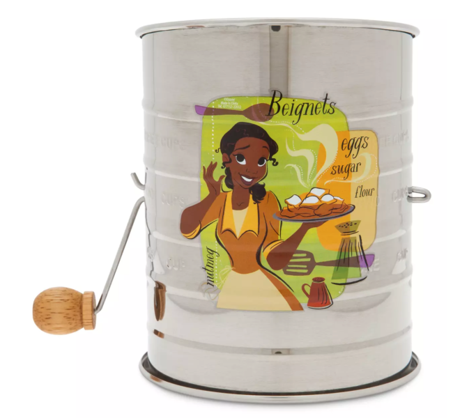 https://www.disneyfoodblog.com/wp-content/uploads/2022/07/shopdisney-2022-epcot-international-food-and-wine-festival-merchandise-princess-and-the-frog-tiana-stainless-steel-flour-sifter-660x600.png