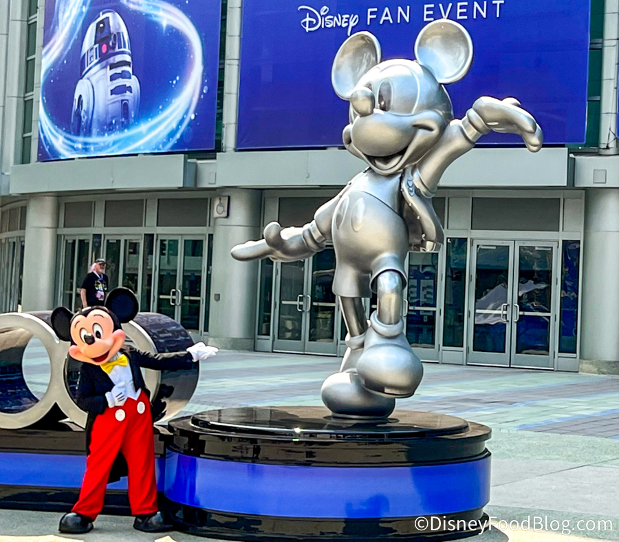 https://www.disneyfoodblog.com/wp-content/uploads/2022/09/2022-D23-Expo-anaheim-convention-center-exterior-mickey-mouse-with-statue-2.jpg