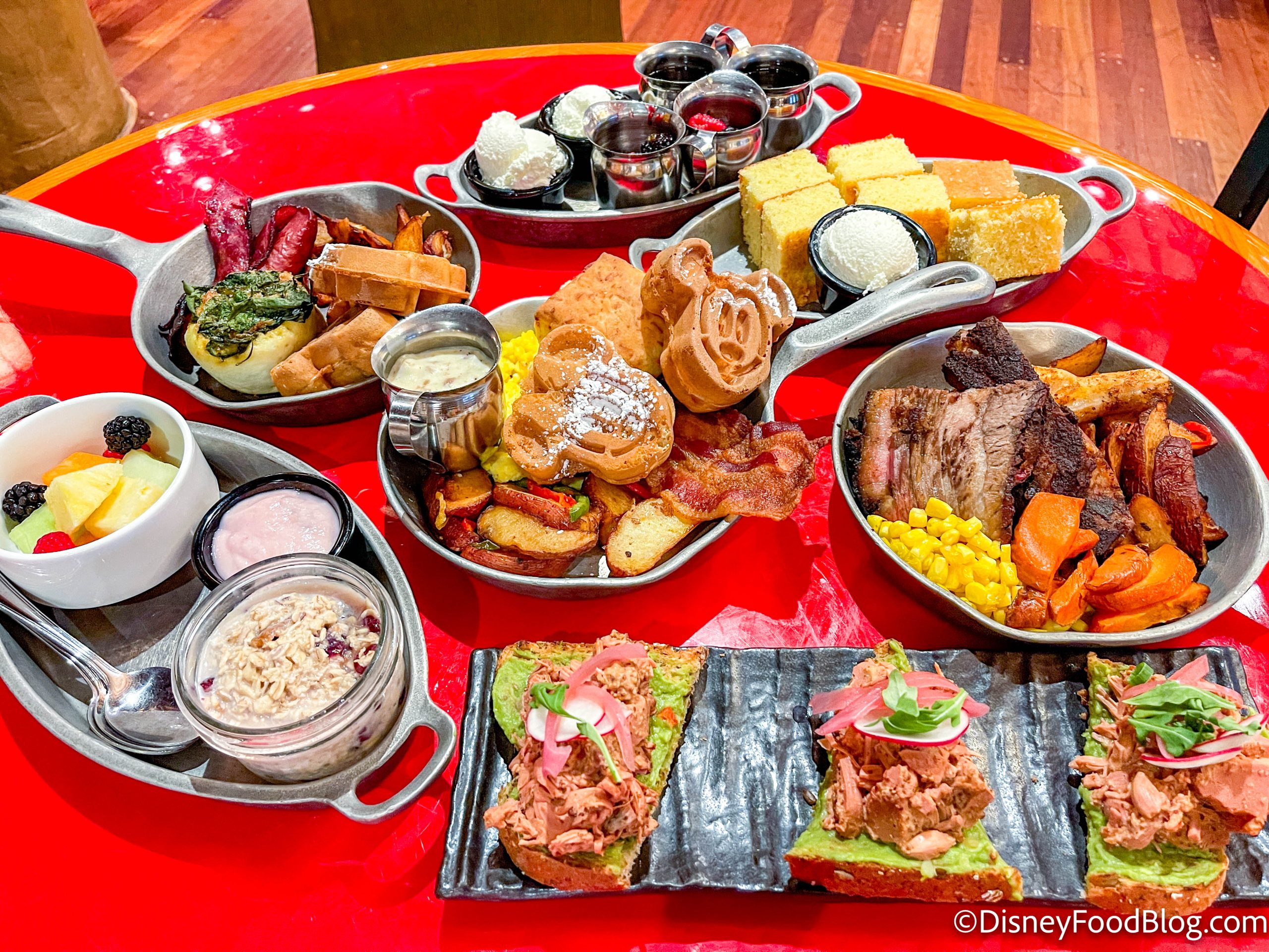 https://www.disneyfoodblog.com/wp-content/uploads/2023/02/2023-wdw-disneys-wilderness-lodge-whispering-canyon-cafe-review-brunch-breakfast-FULL-SPREAD-76-scaled.jpg
