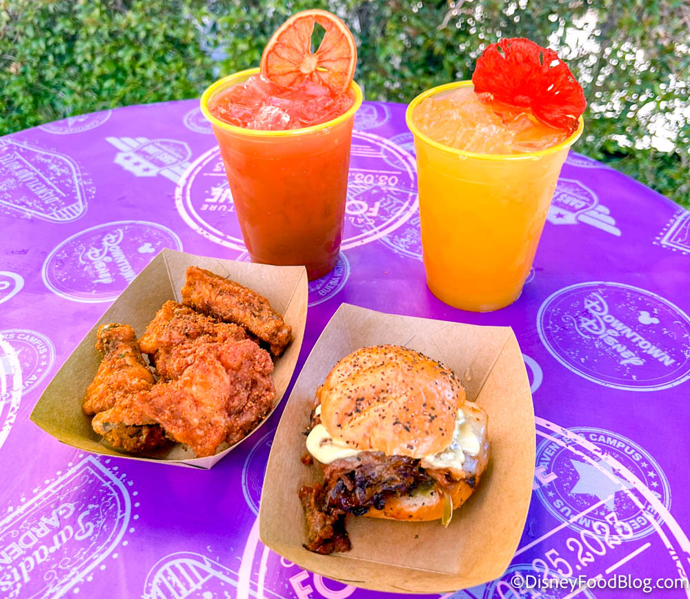 https://www.disneyfoodblog.com/wp-content/uploads/2023/03/2023-dlr-dca-disney-california-adventure-food-and-wine-festival-cluck-a-doodle-moo-booth-full-spread.jpg