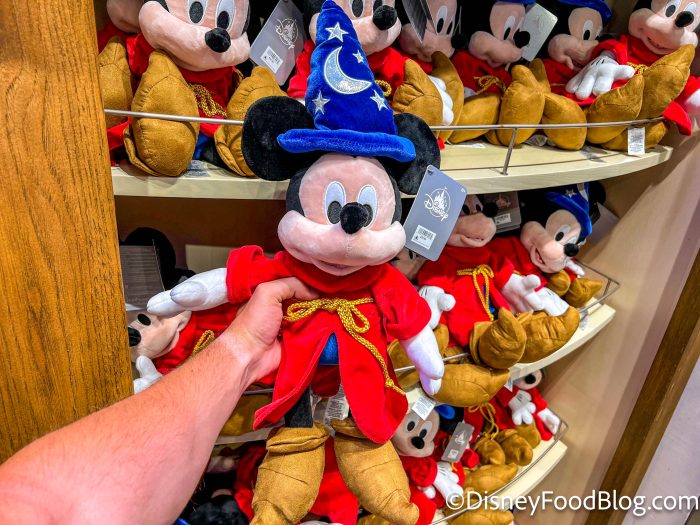 https://www.disneyfoodblog.com/wp-content/uploads/2023/04/wdw-2023-disney-springs-world-of-disney-mickey-sorcerer-plush-700x525.jpg