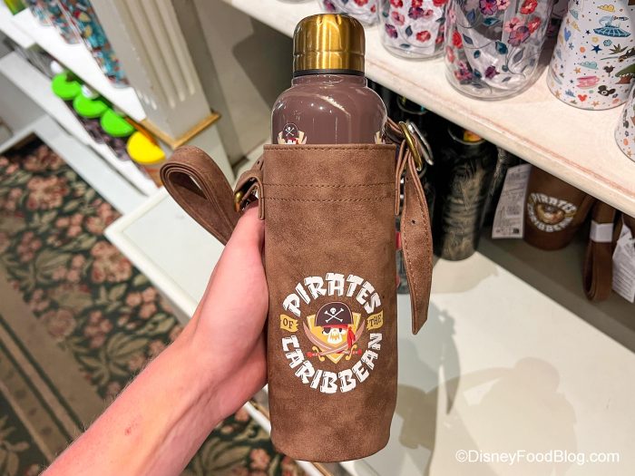 https://www.disneyfoodblog.com/wp-content/uploads/2023/09/2023-dlr-disneyland-china-closet-pirates-of-the-caribbean-water-bottle-with-carrier-700x525.jpg